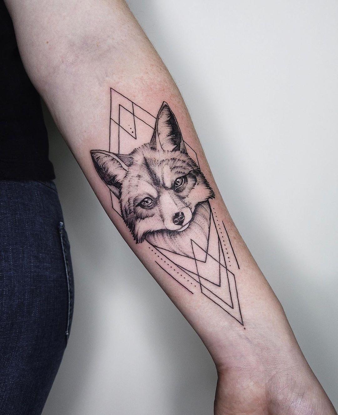 Koit Tattoo  Fox tattoo on arm with geometric elements and