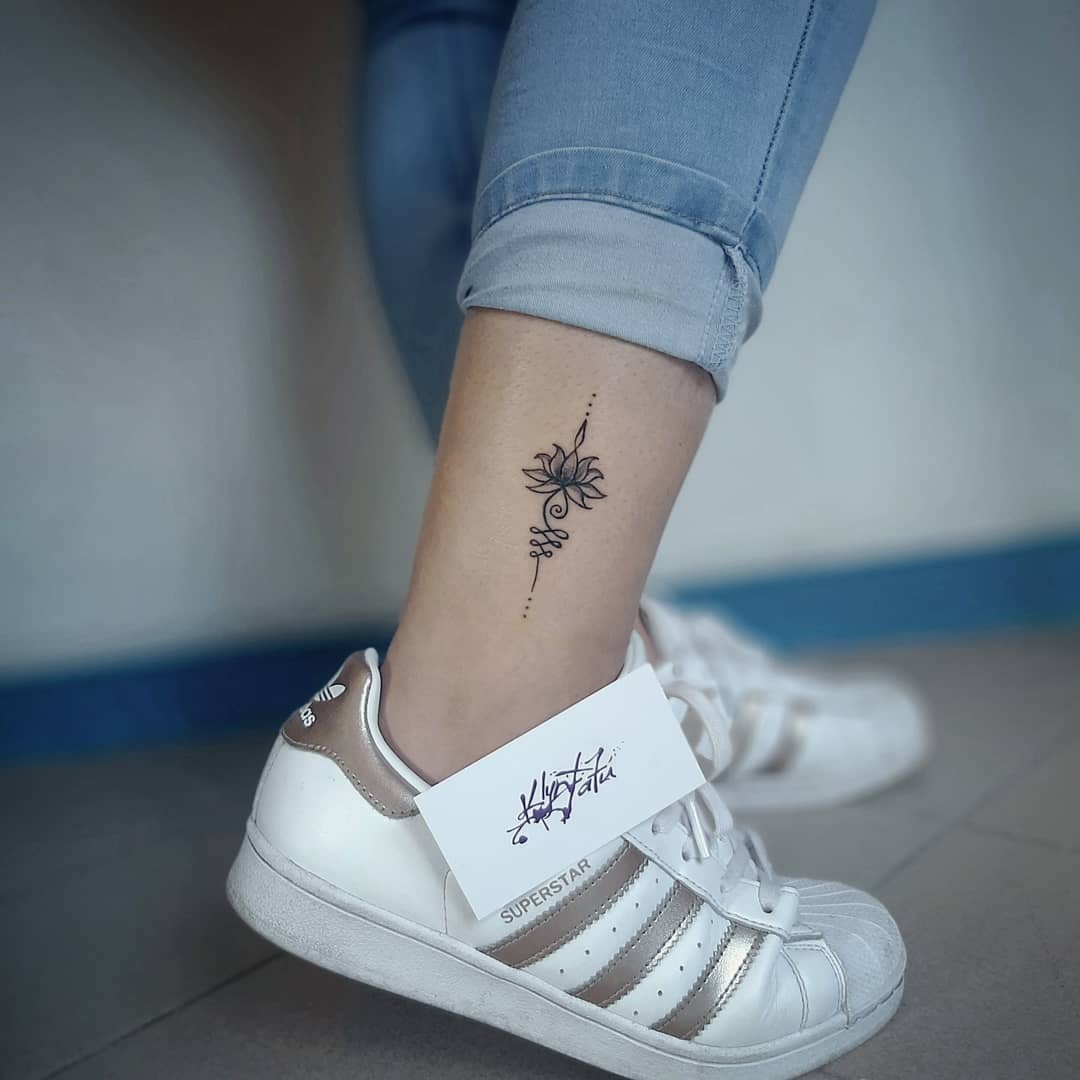 Small lotus flower by tattooist picsola  Tattoogridnet